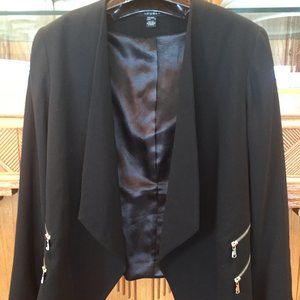 Classic black blazer with silver pocket details